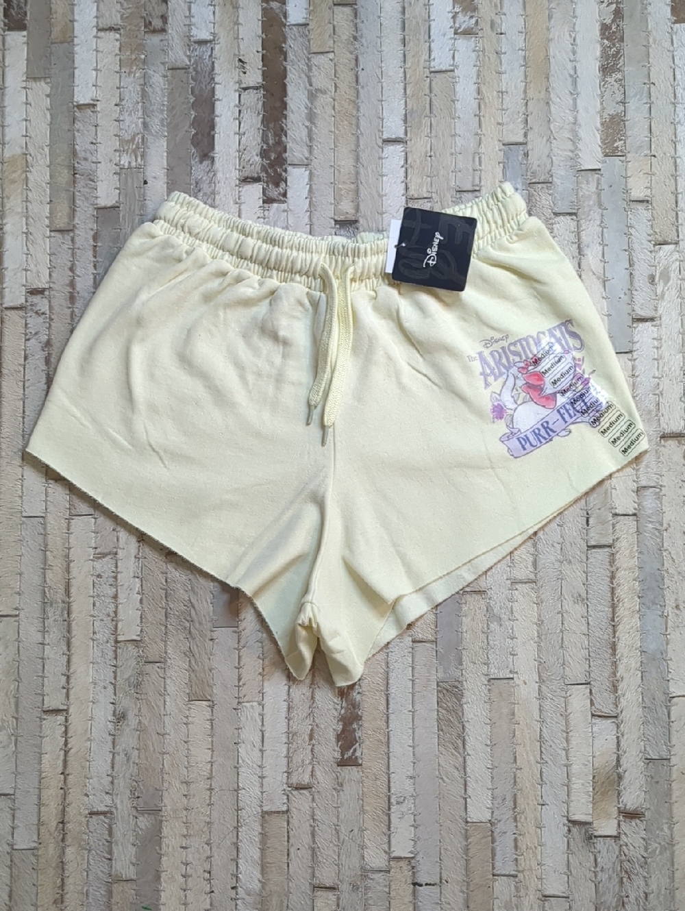 Disney Women's M NWT Aristocrats Yellow Fleece Sweat Shorts